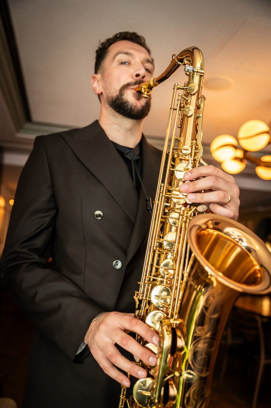 Josh portrait with saxophone