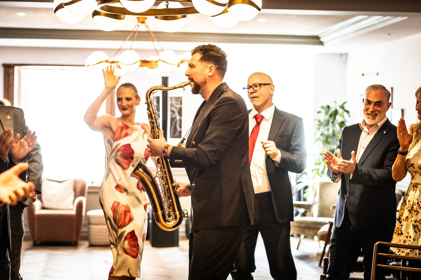 Josh playing saxophone, click to read the frequently asked questions