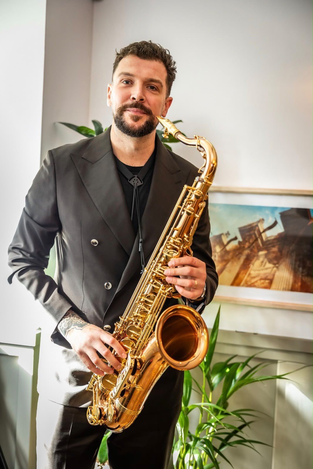 Josh portrait with saxophone